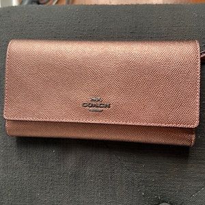 NWT Coach tri-fold wallet in rose gold